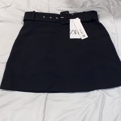 Zara Black Mini Skirt Belted Black Mini Skirt For Workwear, Black Belted Skirt For Party, Black Belted Skirt For Night Out, Belted Black Mini Skirt, Black Belted Mini Skirt For Fall, Fitted Black Belted Mini Skirt, Black High Waist Belted Skirt, High Waist Black Belted Skirt, Chic Black Belted Skirt