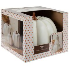 white pumpkins in a cardboard box with the lid open to show it's inside