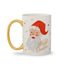 a white and gold coffee mug with a santa claus face on it's side