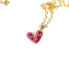 Tiny heart necklace - pink heart necklace - gold heart necklace - love necklace - bff necklace An itty bitty magenta pink heart having happily from a 14k gold vermeil chain at the length of your choice! This tiny, gold plated brass heart holds 5 sparkly crystals. Heart measurement: 8mm Looking for other charm necklaces? https://www.etsy.com/shop/BubuRuby?section_id=12318467 More from Bubu Ruby? https://www.etsy.com/shop/BubuRuby?ref=si_shop ♥ Handmade with love in sunny California ♥ These gems w Pink Pendant Charm Necklace With Delicate Chain, Pink Heart Charm Necklace With Heart Pendant, Pink Heart Pendant Necklace With Heart Charm, Pink Gold Heart Charm Necklace As Gift, Pink Gold Heart Charm Necklace For Gift, Pink Personalized Double Heart Necklace, Cute Pink Heart Charm Necklace, Cute Pink Heart-shaped Charm Necklace, Cute Pink Heart Pendant Necklace