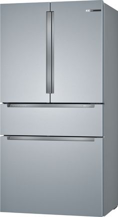 a silver refrigerator freezer sitting next to each other