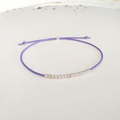 Minimalist, wearable and delicate silver multicolor thread bracelet available in several colors. Length: 20cm adjustable knot. Width: 2mm. Fully adjustable, Handmade in Spain. More colors available in this product => https://www.etsy.com/listing/845364478/tiny-simple-cord-sterling-silver-wish Ideal for a gift and for combinate with other bracelets. All our products are presented in a white organza bag. ♡ Made with love in Valencia ♡ ----------------------------- Discover the NICTE bracelets c Adjustable Friendship Bracelets With Silver Beads As Gift, Minimalist Adjustable Friendship Bracelets, Silver Beaded Bracelets With Sliding Knot, Sterling Silver Friendship Bracelet With Sliding Knot, Dainty Silver Friendship Bracelets With Round Beads, Sterling Silver Adjustable Friendship Bracelets, Everyday Adjustable Sterling Silver Friendship Bracelets, Minimalist Silver Bracelets With Sliding Knot, Silver Minimalist Bracelet With Sliding Knot