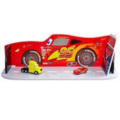 a red race car with flames on it and a yellow truck next to it in front of a white background