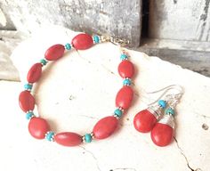 "This beautiful true red and turquoise toggle bracelet will add a pop of color to any outfit. A great stacking piece for your spring and summer wardrobe. Red oval shaped howlite stones are accented with bali sterling silver spacers and genuine blue and green turquoise rondelle shaped stones. Choose from a toggle style closure or lobster clasp. Choose from 7\", 7.5\" or 8\" in length. All my jewelry comes gift boxed with a bow ready for gift giving, whether it is a gift for you or someone special Adjustable Red Southwestern Bracelets, Southwestern Style Adjustable Red Bracelets, Southwestern Style Red Beaded Bracelets For Gift, Southwestern Style Red Beaded Bracelet As Gift, Wire Wrapped Turquoise, Jewelry Stacking, Red And Turquoise, Lapis Jewelry, Lapis Earrings