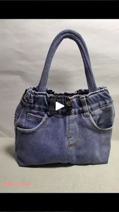 a handbag made out of old jeans is shown in this video screen graber