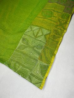 Light olive green mul cotton saree with Kantha work Green Resham Embroidered Cotton Silk Blouse Piece, Green Mulmul Kurta With Zari Work, Festive Green Chikankari Embroidery Blouse Piece, Green Chanderi Pre-draped Saree For Festivals, Festive Green Blouse With Chikankari Embroidery, Green Saree Blouse Piece With Resham Embroidery, Green Chanderi Traditional Wear With Chikankari Embroidery, Green Chanderi Saree With Resham Embroidery, Green Tussar Silk Pre-draped Saree With Dupatta