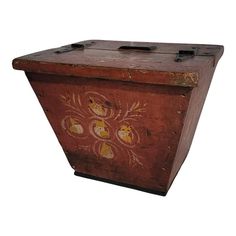 an old wooden box with painted designs on it