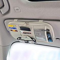 the inside of a car with several items in it