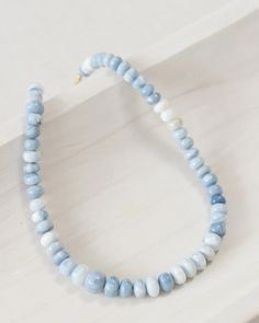 Our Denim necklace features stunning Denim Opal beads with 14k gold vermeil hardware. Elevate your style with this beautiful and versatile piece. Blue Beaded Necklaces With Gemstone Beads, Everyday Blue Gemstone Beaded Necklaces, Everyday Blue Gemstone Beaded Necklace, Denim Necklace, Beachy Jewelry, Opal Beads, Stacked Jewelry, Jewelry Case, Summer Jewelry