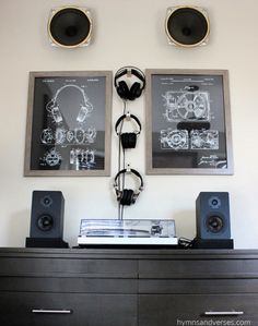 there are two speakers and headphones on the dresser