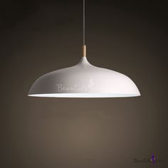 a white light hanging from a ceiling with the word beautiful written on it's side