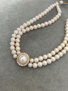 Vintage 2-strand faux pearl choker necklace  The pearls  measures 6.8mm in diameter.  The length of the choker measures 13.5 inches long ( including the clasp) plus 3 inches extension pearl chain.  Elegant and chic, the champagne pearls shimmer beautifully. In very good vintage condition. Chic Costume, Vintage Campaign, Choker Style Necklace, Vintage Choker, Necklace Elegant, Pearl Choker Necklace, Choker Style, Elegant Chic, Pearl Choker