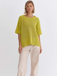 Our Chartreuse Crochet Short Sleeve Top offers a relaxed and chic style suitable for various occasions. Crafted from knit fabric, it provides comfort and breathability, making it ideal for throwing on after a beach day or pairing with white denim. Featuring a boatneck and oversized fit, it exudes effortless elegance and versatility. Whether worn on vacation or layered over a t-shirt dress for added warmth and style, this top is a perfect choice for your wardrobe. SIZE & FIT Fit is true to size M Vacation Pointelle Knit Sweater With Crew Neck, Vacation Crew Neck Sweater In Pointelle Knit, Crew Neck Pointelle Knit Sweater For Vacation, Knit Fabrication Crew Neck Sweater For The Beach, Trendy Open Knit Crochet Top For Beach, Casual Crochet Top With Open Knit Crew Neck, Beach Green Knit Tops, Summer Green Open Knit Sweater, Trendy Summer Crochet Top With Pointelle Knit