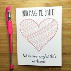 a note with a heart drawn on it and a pen next to it that says, you make me smile