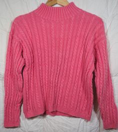 "Item:  Pullover mock turtleneck sweater in a vibrant salmon or coral color! Size:  Small Color(s):  Coral / salmon Brand:  Honors Apparel Fabric:  Ramie, cotton Length: 20\" (measured from back neckline to bottom of hem) Chest:  36\"  (measured outside of sweater at the armpits, unstretched) Sleeve: 17 1/2\"  (measured from shoulder seam area to hem of cuff) More good things about this item:  Vintage 1980's, excellent condition. Please let me know if you have any questions. My vintage clothing Pink Ribbed Collar Winter Sweater, Casual Pink Winter Turtleneck, Pink High Neck Top For Winter, Winter Funnel Neck Pink Sweater, Pink Funnel Neck Sweater For Winter, Pink Knitted Turtleneck Top, Pink Knit Sweater With Ribbed Collar, Winter Cable Knit Pink Top, Winter Pink Cable Knit Tops