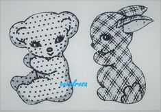 two teddy bears sitting next to each other on top of a white sheet with black dots