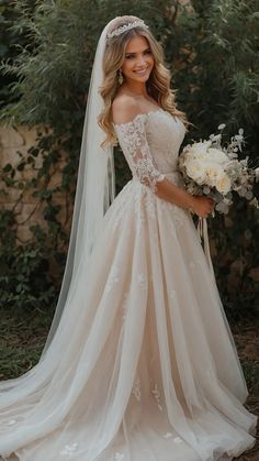 a woman in a wedding dress holding a bouquet