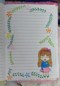 an open notebook with a drawing of a girl on it