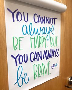 a sign on the door saying you cannot always be happy but you can always be brave