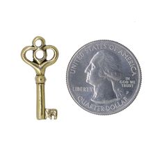 Skeleton Key Gold Lapel Pin The skeleton key is the pass key, or master key, opening numerous locks. It’s derived from the idea that it has been reduced to its essential parts. Whether you are a realtor gifting out the keys at closings, or want to convey to someone that they are essential, our skeleton key pin is a perfect fit. Hand cast in solid, lead free pewter and then dipped in 22K gold, our key pins arrive packaged on our signature presentation card, making them ready for gift-giving! Host The Skeleton Key, Gold Skeleton, Key Key, Est Sign, Helvetica Neue, Skeleton Keys, Master Key, Presentation Cards, Quarter Dollar