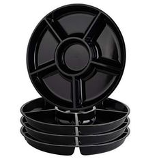 black plastic plates stacked on top of each other