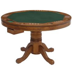 a wooden table with a green cloth on top