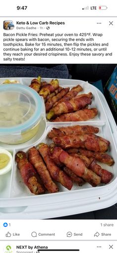 an image of bacon wrapped in ketchup and other food items on a tray