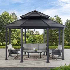 an outdoor gazebo with chairs and tables