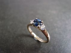 Blue Sapphire and White Sapphire Engagement Ring White Sapphire Engagement Ring, Sapphire Rings, White Sapphire Ring, Sapphire Engagement Ring, Three Stone Engagement, Three Stone Engagement Rings, Natural Blue Sapphire, Sapphire Engagement, Yellow Sapphire