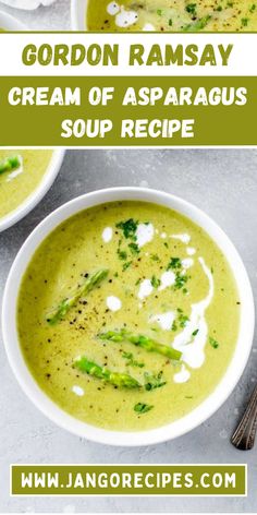 two bowls filled with cream of asparagus soup on top of a gray table