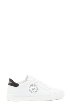 The brand's logo and a contrasting collar define a low-top sneaker shaped from smooth leather and secured with a classic lace-up closure. Leather upper/textile lining/synthetic sole Imported Low-top Sneakers With Logo Detail And White Sole, Low-top Sneakers With Logo And White Sole, Low-top Sneakers With White Sole And Logo Detail, Leather Platform Sneakers With Logo Detail And Round Toe, Leather Platform Sneakers With Logo Print And White Sole, Leather Platform Sneakers With Logo Print, Classic Low-top Custom Sneakers With Logo Print, Classic Lace-up Sneakers With Logo Print, Leather Low-top Sneakers With Logo Print