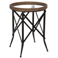 a round wooden table with metal legs and a glass top on an isolated white background