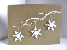 a card with snowflakes hanging from it