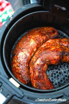 two pieces of meat in an air fryer