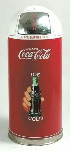 an old coca - cola can with the label ice cold