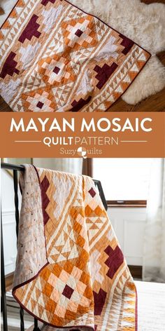 an orange and white quilt sitting on top of a chair