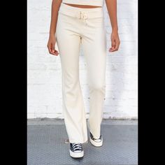 Soft Cotton Blend Tie Yoga Pants With A Big Flare Pant Leg. Fabrics: 100% Cotton Measurement: 10" (30 Cm) Rise, 34" (81 Cm) Inseam, 15" (66 Cm) Waist (Stretches) Made In: Italy Fitted Wide-leg Sweatpants With Elastic Waistband, Fitted Wide Leg Sweatpants With Elastic Waistband, Trendy Fitted Sweatpants For Loungewear, Chic Fitted Full-length Sweatpants, Fitted Wide Leg Athleisure Sweatpants, Fitted Wide Leg Sweatpants, Chic Fitted Straight Leg Sweatpants, Chic Fitted Straight Sweatpants, Fitted Athleisure Sweatpants For Spring