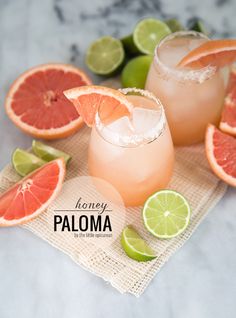 grapefruit and lime margaritas on a napkin with the words honey paloma