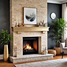 a living room filled with furniture and a fire place in front of a brick fireplace