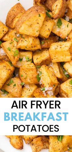 air fryer breakfast potatoes in a white bowl with parsley on top and text overlay that reads, air fryer breakfast potatoes