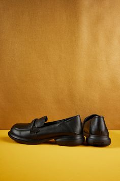 Introducing our Rumour Has It Simple Your Way Leather Loafer! Comfort and style come together in these classic black loafers. Made from high-quality leather, these loafers are perfect for any occasion. Step out in confidence and take on the day with ease. Simplify your style with our Simple Your Way Leather Loafers. 0.98" heel Pull-on Leather upper Leather lining Leather footbed Rubber sole Slip-on Leather Shoes With Round Toe For Business Casual, Black Loafers With Stitched Sole And Round Toe, Black Slip-ons With Rubber Sole For Work, Workwear Slip-ons With Brogue Detailing And Round Toe, Swift Leather Loafers With Round Toe, Black Textured Sole Slip-ons For Business Casual, Leather Closed Toe Slip-ons For Business Casual, Black Slip-on Loafers With Removable Insole, Black Flat Heel Loafers With Stitched Sole