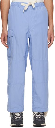 Cotton- and polyester-blend broadcloth cargo pants. · Paneled construction · Drawstring at elasticized waistband · Four-pocket styling · Zip-fly · Concealed drawstring at cuffs · Cargo pocket at outseam Supplier color: Sax Cargo Pocket, Bottoms Pants, Cargo Pants, Apparel Accessories, Outfit Accessories, Pants, Blue, Clothes, Color