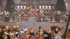 an animated halloween scene with pumpkins and other decorations