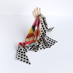 "A newly designed triangle shape scarf is composed by Cinne in two of her original prints. Throw it on for an instant chic statement, giving any look a stylish twist. Style it around your neck or waist or in your hair. This soft triangle scarf is large enough to cover your head and looks fabulous under a hat. It's constructed entirely by hand with love and attention to every detail. Ready to ship, ready to gift. color Black and white scallop dots surround a center circle containing a bold, delig Chic Multicolor Scarves For Summer, Chic Multicolor Summer Scarves, Chic Multicolor Shawl Scarves, Chic Multicolor Shawl Scarf, Chic Multicolor Silk Scarf For Parties, Trendy Multicolor One-size Silk Scarf, Chic Hair, Twist Style, Triangle Scarf