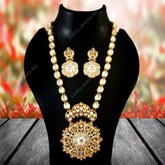 This is a stunning handmade necklace perfect for high end Jewelry Collector, a keeper in Traditional Vintage Indian/Pakistani Bridal jewelry and a Luxury Gift for your Daughter, Sister or Wife on Wedding or Anniversary. Perfect for any type of occasions, weddings And celebrations and a beautiful & memorable gift for weddings and special occasions. -Item Code:- -Polki Diamond Necklace Set with Earrings. -Designer Meenakari Kundan Necklace. -Gold Plated Set with Kundan Stones which shine like Polki Diamonds. -Metal: Gold plated brass -Earrings are 55mm long & 30mm wide approx -Push Back Earrings -Necklace length with pendant 10.5" approx excluding adjustable dori/cord -Quantity:- One Necklace Set Please see more different designs here:- https://www.etsy.com/in-en/shop/LUCKYJEWELSART?ref=sell Diamond Flower Necklace, Pakistani Bridal Jewelry, Necklace Set With Earrings, Earrings Trendy, Diamond Necklace Set, Kundan Necklace, Kundan Necklaces, Gold Necklace Designs, Bridesmaid Necklace