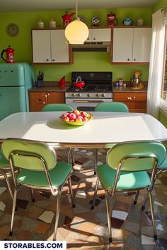 a bowl of fruit is on the table with four chairs in front of it and an oven