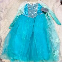 Brand New, Gorgeous, Disney, Frozen, Elsa, Princess, Dress. By The Disney Store! Gorgeous! Size 7/8 Fast Shipping Princess Style Long Sleeve Holiday Dress, Blue Long Sleeve Princess Dress For Fancy Dress, Blue Disney Dress For Costume Party, Blue Fitted Disney Dress, Blue Princess Dress For Winter, Blue Winter Princess Dress, Disney Princess Dress For Dress-up, Elsa Princess Dress, Frozen Princess Dress