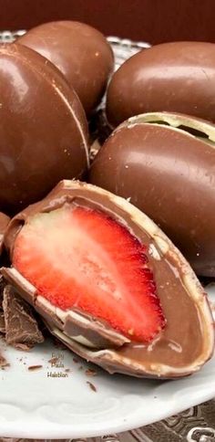 some chocolate covered strawberries on a plate