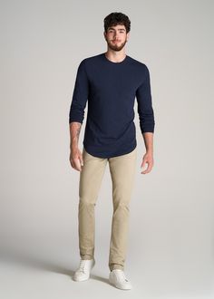 About Our Slub Long Sleeve Scoop Tall Men's Tee If you need to stock up on essentials, don’t miss out on this tall long sleeve shirt. It’s made with a stretch-infused cotton slub jersey that has a slightly textured yet supremely soft finish. The close fit is designed to sit next to the body and makes this an ideal layering or lounging piece. We made this extra long top with a scooped hem for a classic menswear feel that looks good on its own or under a sweater. This tee lands at the hip and has Scrubs Dress, Cozy Sleepwear, Clothing Aesthetic, Classic Menswear, Fall Outfits Men, Men's Long Sleeve T-shirt, Sports Blazer, Business Casual Men, Outfits Men