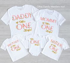 three matching shirts with the words,'mommy of one, mom of one, and another